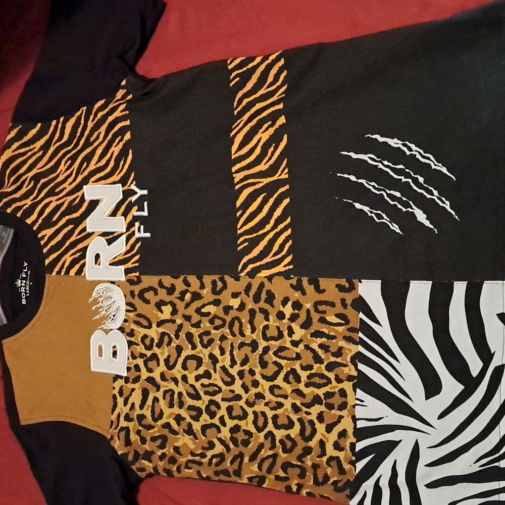 A kids 14/16 Casual T-shirt never been worn